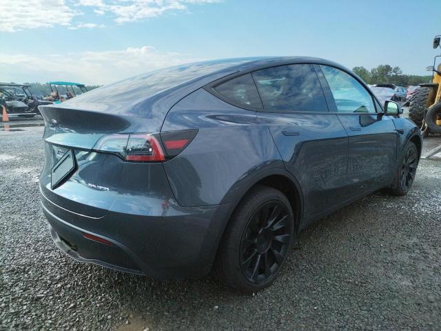 Снимка 3 от търг – 2022 TESLA MODEL Y с VIN 7SAYGDEE6NF463511