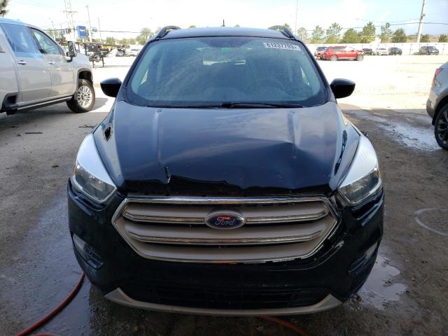 Photo 5 from auction – 2018 FORD ESCAPE SE with VIN 1FMCU0GD4JUA08618