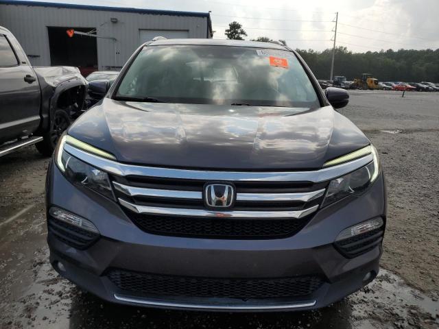 Photo 5 from auction – 2018 HONDA PILOT ELIT with VIN 5FNYF6H06JB045147