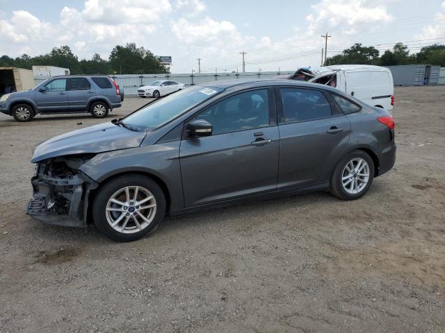 FORD FOCUS SE 2015 with VIN 1FADP3F20FL210554 - Photo from auction