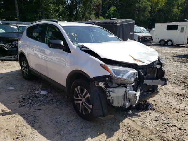 Photo 4 from auction – 2018 TOYOTA RAV4 LE with VIN JTMZFREV7JJ749906