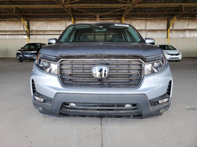 Photo 5 from auction – 2023 HONDA RIDGELINE with VIN 5FPYK3F79PB009964