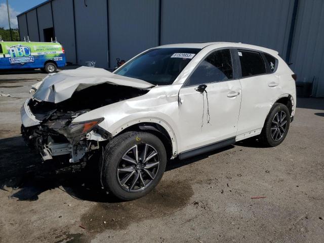 MAZDA CX-5 TOURI 2018 with VIN JM3KFACM7J1376869 - Photo from auction