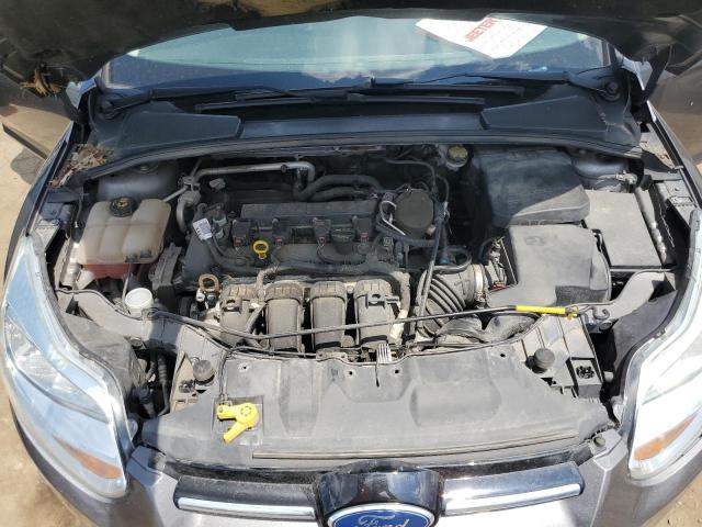 Photo 11 from auction – 2014 FORD FOCUS SE with VIN 1FADP3F23EL195370