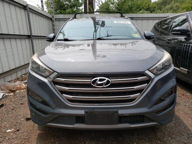 Photo 5 from auction – 2016 HYUNDAI TUCSON with VIN KM8J3CA26GU238169