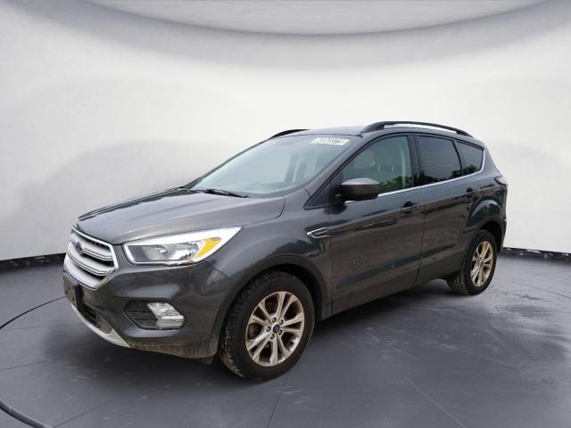 FORD ESCAPE SE 2018 with VIN 1FMCU0GDXJUC90490 - Photo from auction