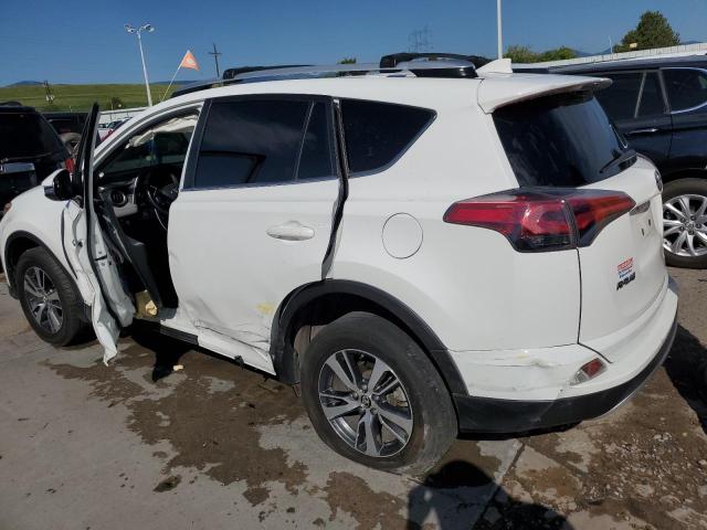 Photo 2 from auction – 2016 TOYOTA RAV4 XLE with VIN JTMRFREV6GJ090659