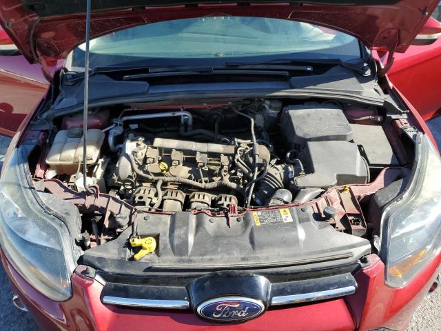 Photo 11 from auction – 2014 FORD FOCUS TITA with VIN 1FADP3J25EL339699