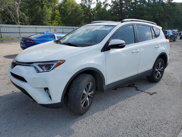 TOYOTA RAV4 XLE 2017 with VIN JTMWFREV7HJ716031 - Photo from auction
