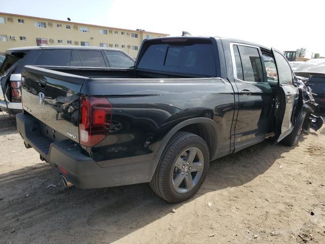 Photo 3 from auction – 2023 HONDA RIDGELINE with VIN 5FPYK3F50PB024562