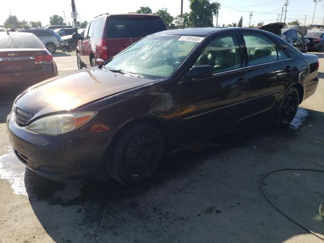 TOYOTA CAMRY LE 2002 with VIN 4T1BF30KX2U502421 - Photo from auction