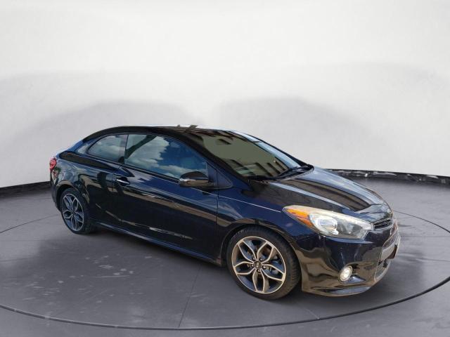 Photo 4 from auction – 2016 KIA FORTE SX with VIN KNAFZ6A39G5580399