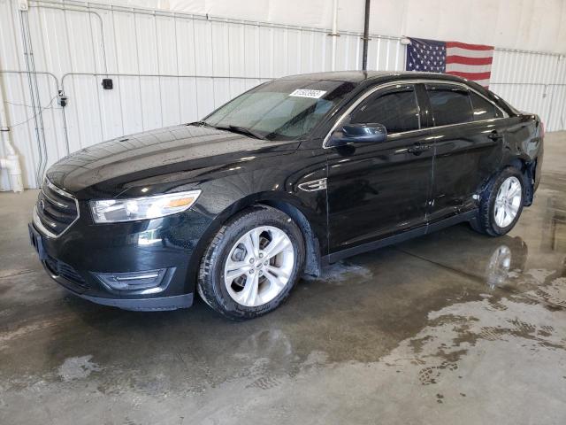 FORD TAURUS SEL 2014 with VIN 1FAHP2H81EG121953 - Photo from auction