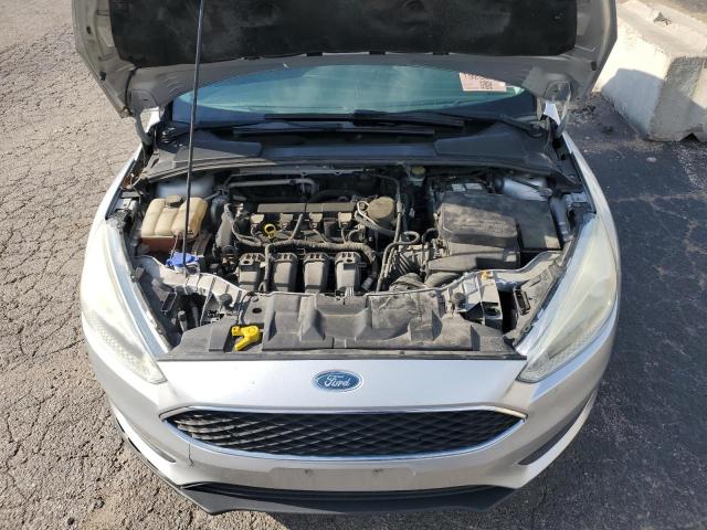 Фото 11 с аукциона – 2015 FORD FOCUS SE с VIN 1FADP3K20FL203108