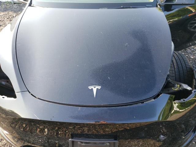 Photo 11 from auction – 2022 TESLA MODEL Y with VIN 7SAYGDEF7NF452266