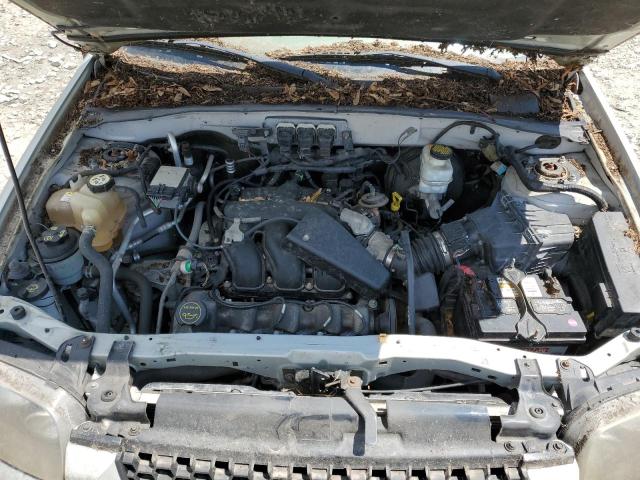 Photo 11 from auction – 2005 FORD ESCAPE LIM with VIN 1FMYU94165KB06457