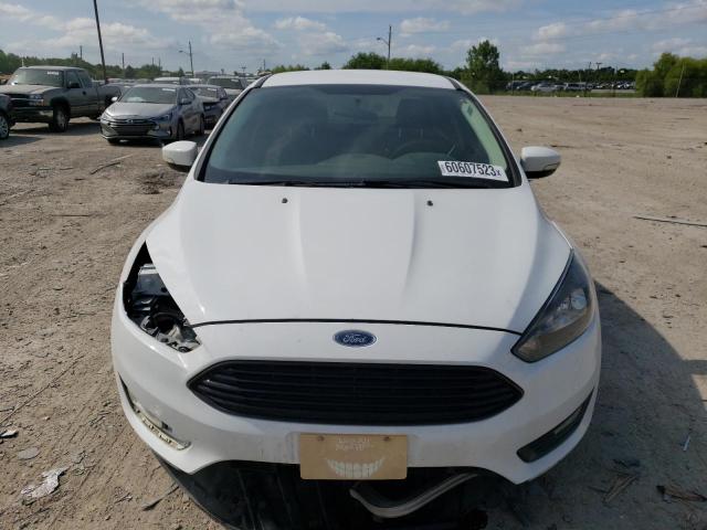 Photo 5 from auction – 2018 FORD FOCUS SE with VIN 1FADP3FE0JL301083