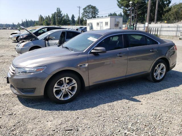 FORD TAURUS SEL 2014 with VIN 1FAHP2E81EG112836 - Photo from auction