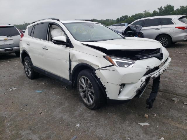 Photo 4 from auction – 2018 TOYOTA RAV4 LIMIT with VIN JTMDFREV0JD243326