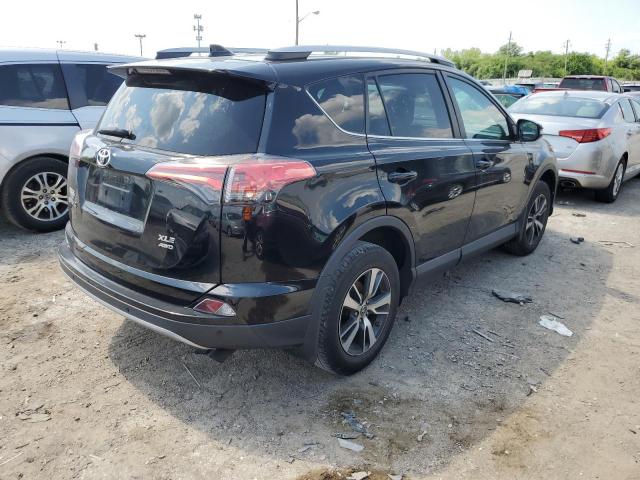 Photo 3 from auction – 2017 TOYOTA RAV4 XLE with VIN 2T3RFREV7HW599310