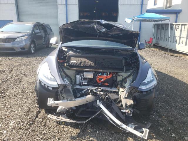 Photo 5 from auction – 2022 TESLA MODEL Y with VIN 7SAYGDEEXNA011672