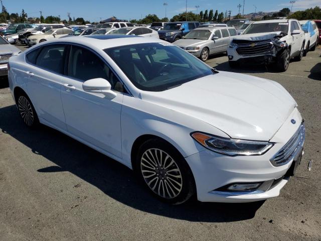 Photo 4 from auction – 2018 FORD FUSION TIT with VIN 3FA6P0D99JR193920
