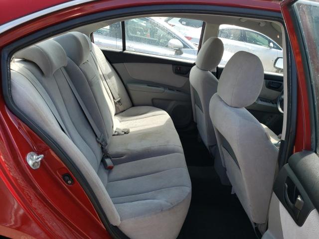 Photo 11 from auction – 2009 KIA OPTIMA LX with VIN KNAGE228X95321572