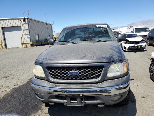 Photo 5 from auction – 2002 FORD F150 SUPER with VIN 1FTRW08L82KB73406