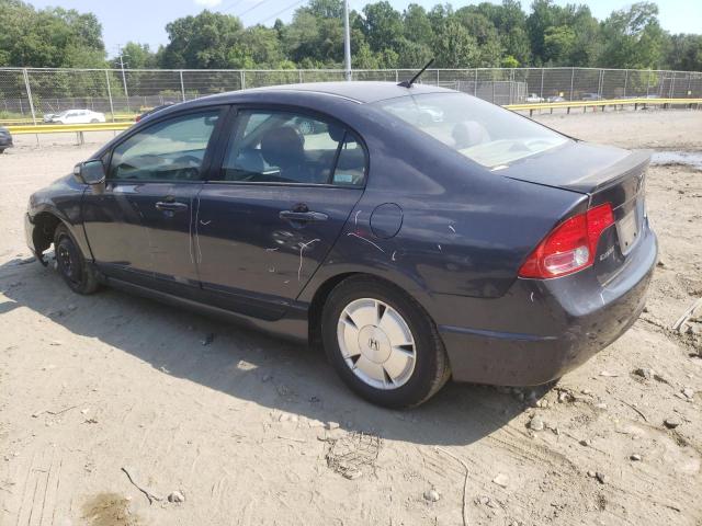 Photo 2 from auction – 2006 HONDA CIVIC HYBR with VIN JHMFA36296S013472
