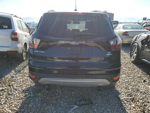 Photo 6 from auction – 2018 FORD ESCAPE SE with VIN 1FMCU9GD4JUA72825