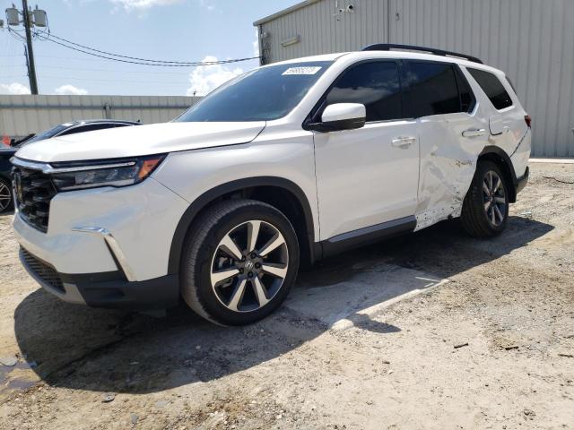 Photo 1 from auction – 2023 HONDA PILOT TOUR with VIN 5FNYG1H75PB018043