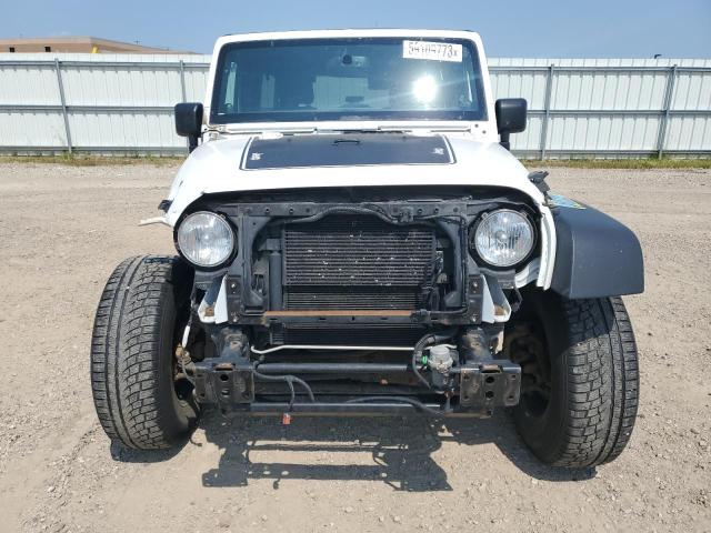 Photo 5 from auction – 2013 JEEP WRANGLER U with VIN 1C4BJWDG8DL674143