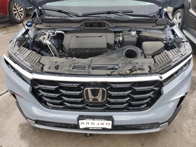 Photo 12 from auction – 2023 HONDA PILOT ELIT with VIN 5FNYG1H81PB021501