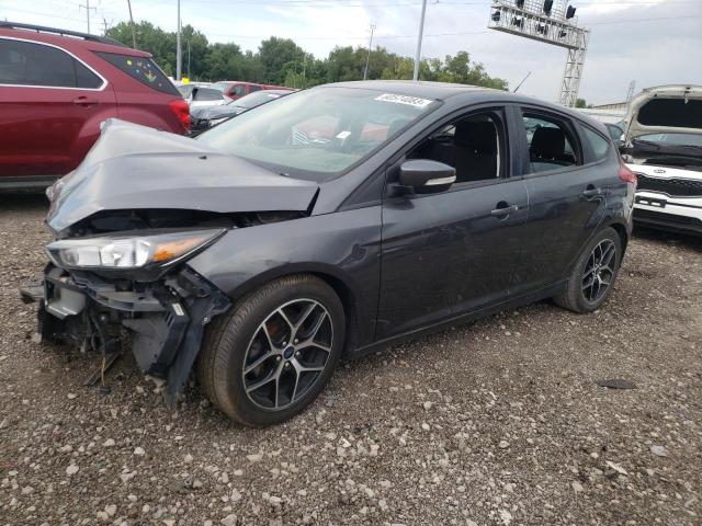 FORD FOCUS SEL 2018 with VIN 1FADP3M21JL310402 - Photo from auction