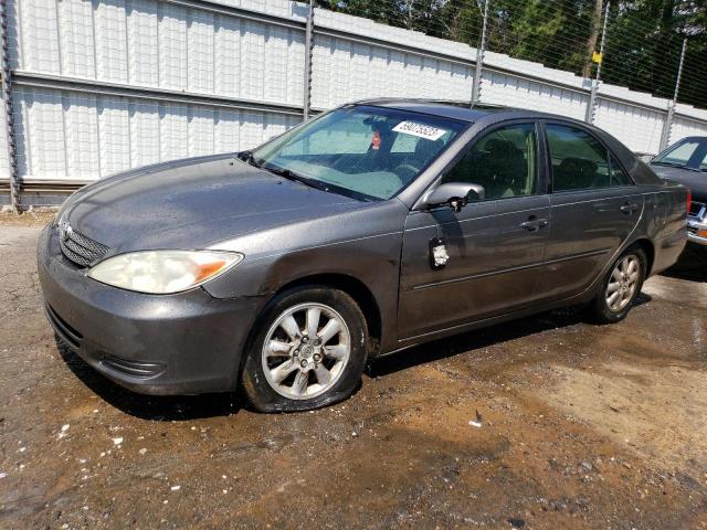 TOYOTA CAMRY LE/X 2002 with VIN JTDBF30K020015823 - Photo from auction