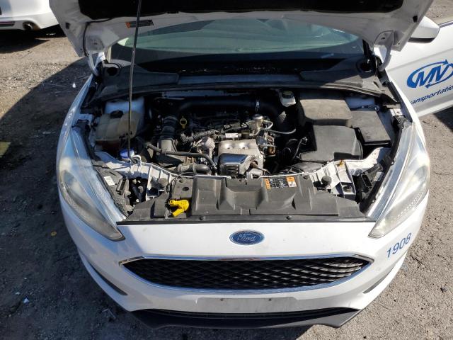 Photo 11 from auction – 2018 FORD FOCUS SE with VIN 1FADP3FE3JL260724