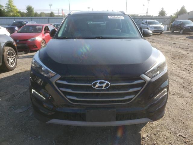 Photo 5 from auction – 2017 HYUNDAI TUCSON LIM with VIN KM8J3CA28HU596780