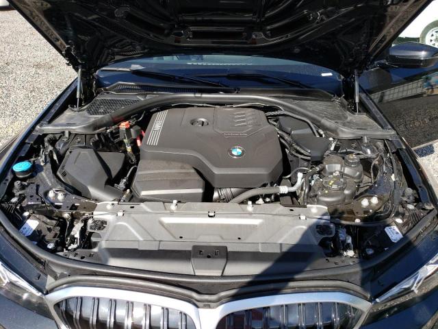 Photo 11 from auction – 2023 BMW 330I with VIN 3MW69FF07P8D36428