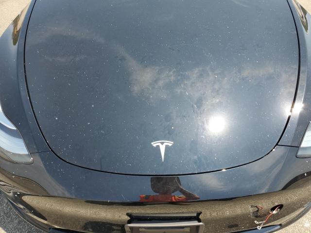 Photo 11 from auction – 2022 TESLA MODEL Y with VIN 7SAYGDEE9NF461428