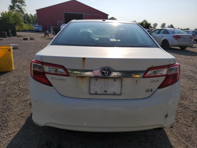 Photo 6 from auction – 2012 TOYOTA CAMRY HYBR with VIN 4T1BD1FK7CU023635