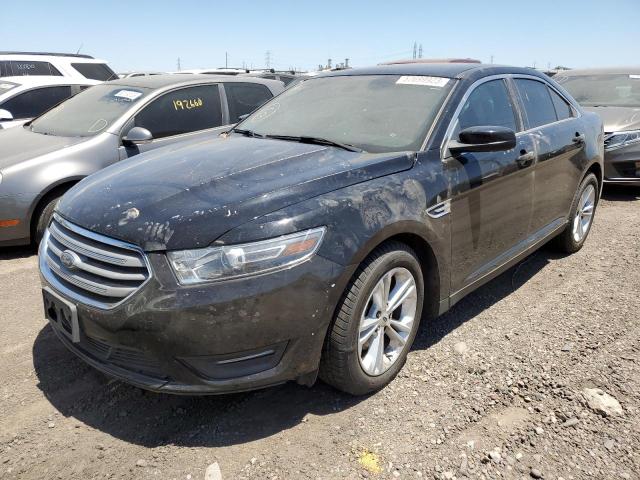 FORD TAURUS SEL 2016 with VIN 1FAHP2E8XGG138547 - Photo from auction