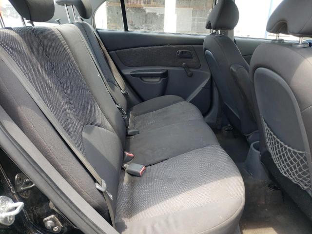 Photo 10 from auction – 2011 KIA RIO BASE with VIN KNADH4A38B6955037