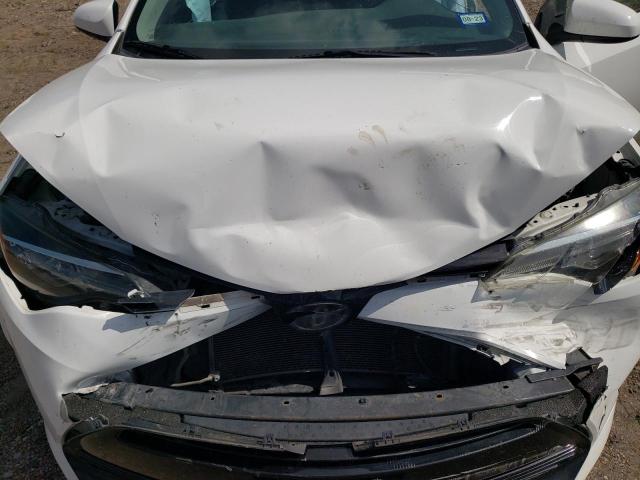 Photo 11 from auction – 2017 TOYOTA COROLLA L with VIN 5YFBURHE4HP679404