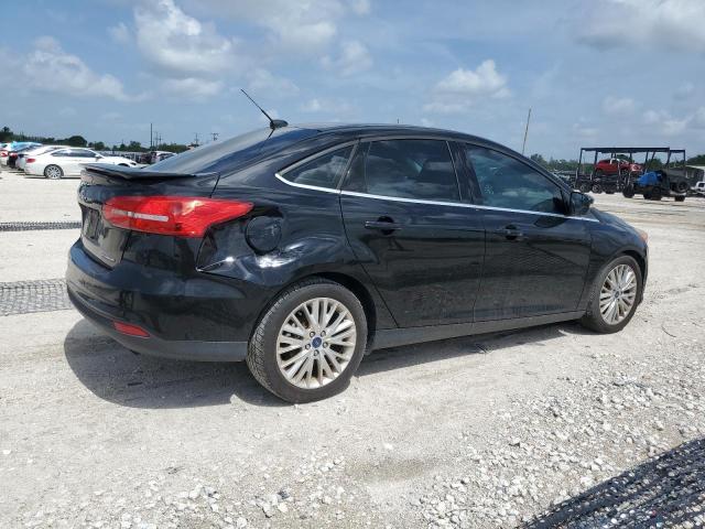 Photo 3 from auction – 2017 FORD FOCUS TITA with VIN 1FADP3J23HL228069