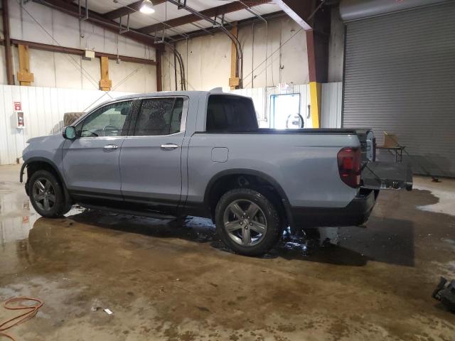Photo 2 from auction – 2022 HONDA RIDGELINE with VIN 5FPYK3F71NB018378