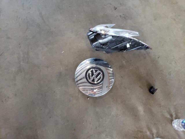 Photo 12 from auction – 2014 VOLKSWAGEN BEETLE with VIN 3VWJ17AT9EM661059