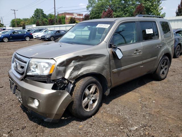 HONDA PILOT EXLN 2011 with VIN 5FNYF4H79BB002022 - Photo from auction