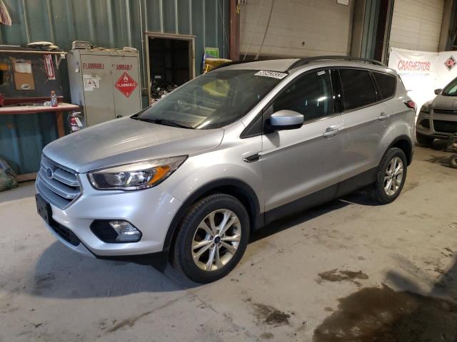 FORD ESCAPE SE 2018 with VIN 1FMCU9GD9JUC87262 - Photo from auction