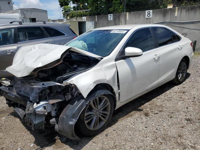 TOYOTA CAMRY LE 2017 with VIN 4T1BF1FK2HU409204 - Photo from auction