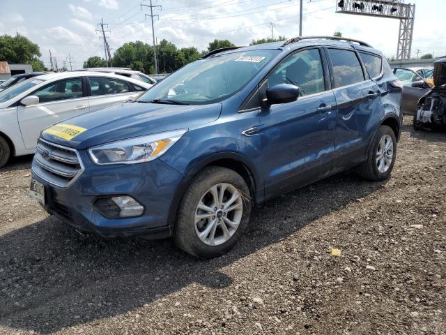 FORD ESCAPE SE 2018 with VIN 1FMCU9GD8JUC02041 - Photo from auction